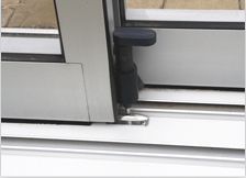 A pool enclosure with a pin latch to prevent it from moving